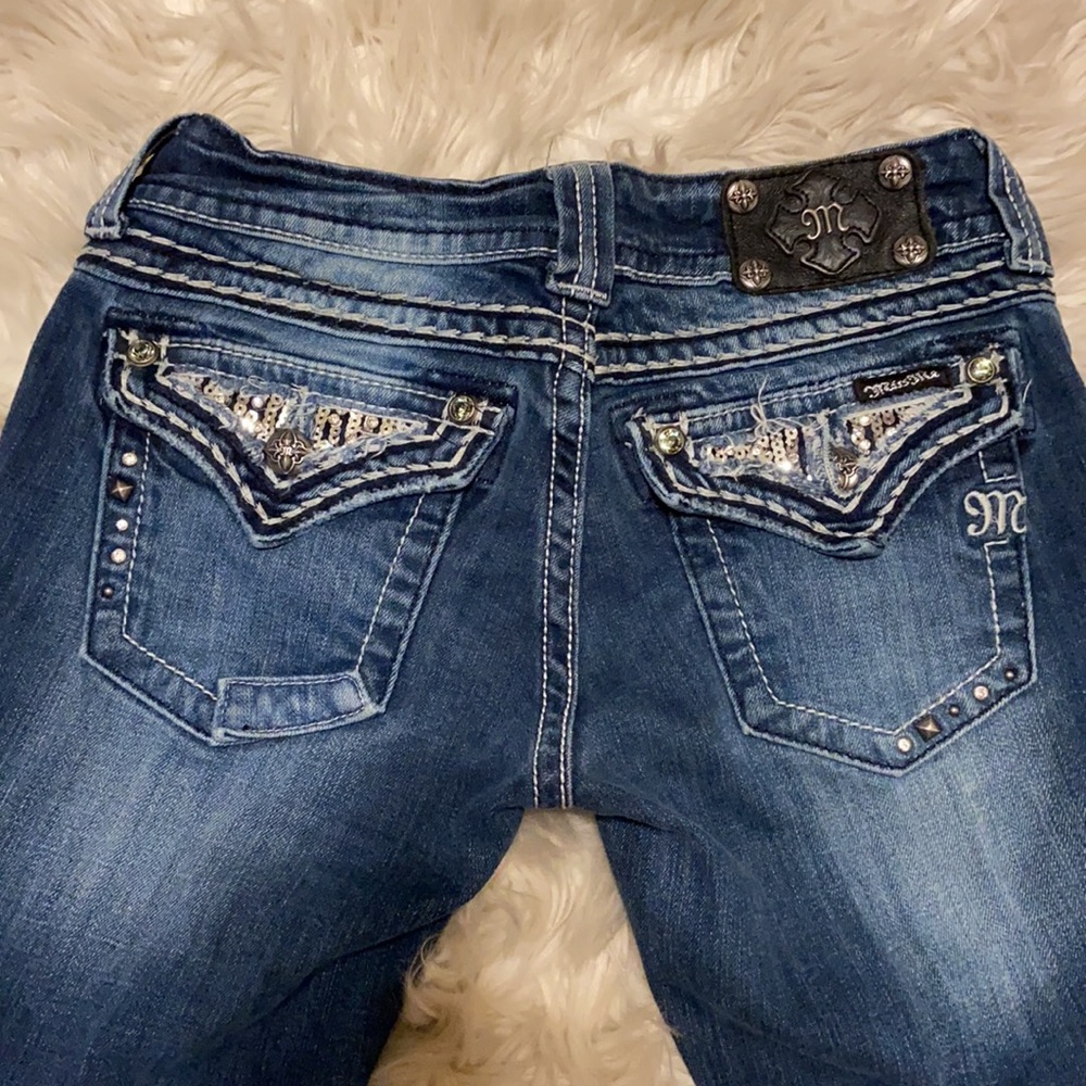 Mixed stud & rhinestone miss me jeans